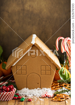 Gingerbead house ready to be decorated with candy Gingerbead house ready to be decorated with candy 102676593