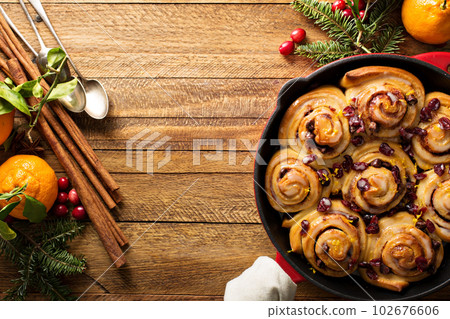 Cinnabon buns with cranberry and orange glaze Cinnabon buns with cranberry and orange glaze 102676606