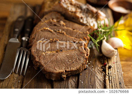 Braised brisket on cutting board Braised brisket on cutting board 102676666