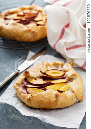 Open pie with plums Open pie with plums 102676730