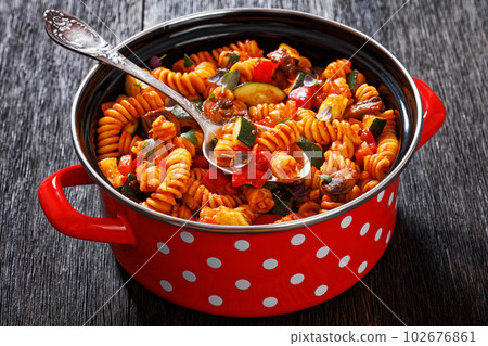 Vegetable with Pasta in red pot, top view Vegetable with Pasta in red pot, top view 102676861