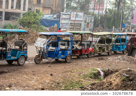 Auto Cars lineup in a row on a roadside. Kolkata West Bengal India South Asia Pacific March 21, 2023 Auto Cars lineup in a row on a roadside. Kolkata West Bengal India South Asia Pacific March 21, 2023 102678678