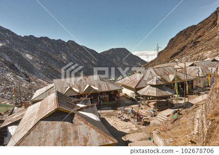 Rooftop of a Bazar Market surrounded by Mountain Valley. Top view. Sikkim West Bengal India Rooftop of a Bazar Market surrounded by Mountain Valley. Top view. Sikkim West Bengal India 102678706