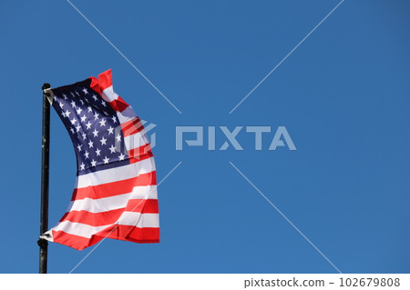 USA flag streaming in wind USA flag streaming in wind 102679808