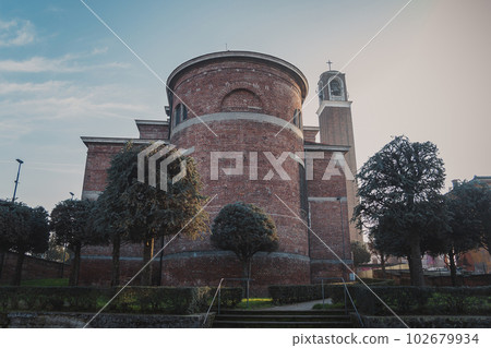 Old medieval cathedral with bell tower in the evening 102679934