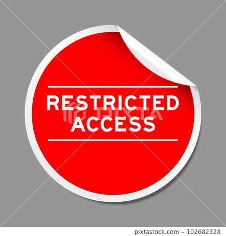 Red color peel sticker label with word restricted access on gray background 102682328