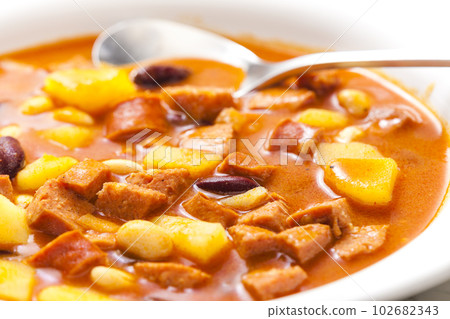 sausage goulash soup with potatoes and beans sausage goulash soup with potatoes and beans 102682343