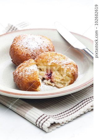 homemade donut filled with marmalade 102682619