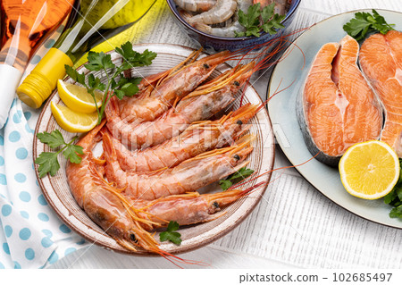 Seafood and Wine on a Table Seafood and Wine on a Table 102685497
