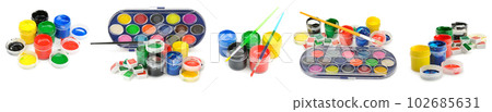 Multicolored watercolor and gouache paints and brushes isolated on white 102685631