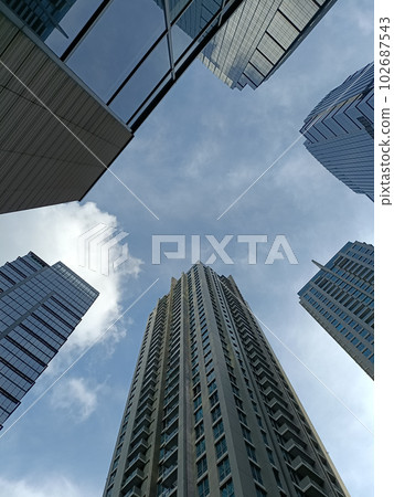 Skyscraper landscape and the blue sky. Skyscraper landscape and the blue sky. 102687543