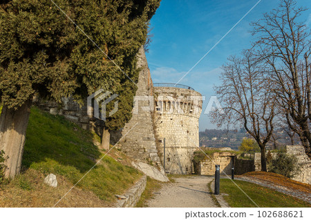 Part of the castle of the city of Brescia on a sunny winter day 102688621