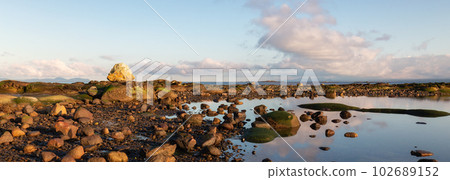 Rocky Shore on the Ocean Coast. Canadian Nature Background. Rocky Shore on the Ocean Coast. Canadian Nature Background. 102689152