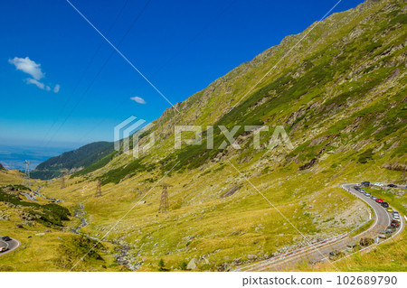 Summer sunday traffic jam on the mountain road Transfagarasan Summer sunday traffic jam on the mountain road Transfagarasan 102689790