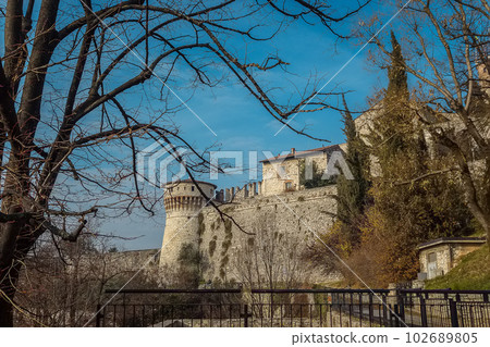 Part of the castle of the city of Brescia on a sunny winter day Part of the castle of the city of Brescia on a sunny winter day 102689805