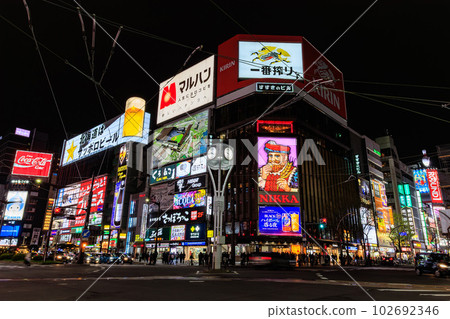 Susukino at night in Sapporo, Hokkaido, bustling with people Susukino at night in Sapporo, Hokkaido, bustling with people 102692346
