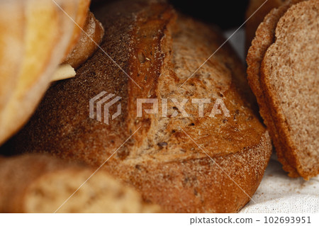 Macro shot of freshly baked bread loaf Macro shot of freshly baked bread loaf 102693951