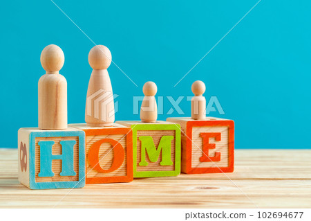 Wooden little family toys. House purchase, sale, rent concept Wooden little family toys. House purchase, sale, rent concept 102694677