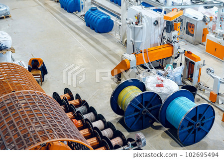 Inside the new factory manufacturing electrical cable. Cable production. Inside the new factory manufacturing electrical cable. Cable production. 102695494