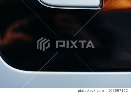 Detail of metal fender of a luxury car Detail of metal fender of a luxury car 102697152