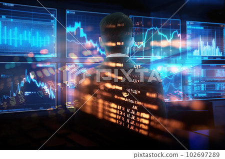 Businessman standing against large media digital screen cyber world concept 102697289