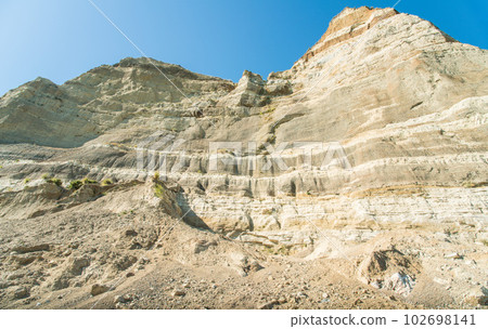 The spectacular geological cliff formations on the coast to Cape Kidnappers in Hawke's Bay region of New Zealand. The spectacular geological cliff formations on the coast to Cape Kidnappers in Hawke's Bay region of New Zealand. 102698141