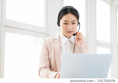 Business woman computer operator Business woman computer operator 102700209