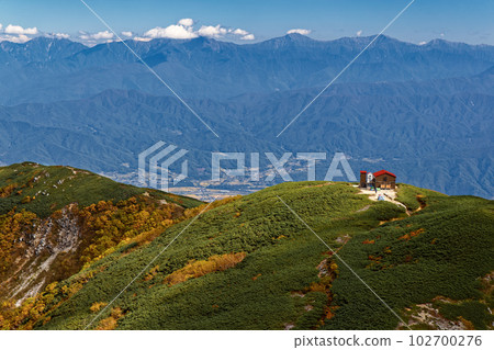 The mountain range of the Southern Alps and the evacuation hut seen from Mt. Hinokio in the Central Alps The mountain range of the Southern Alps and the evacuation hut seen from Mt. Hinokio in the Central Alps 102700276