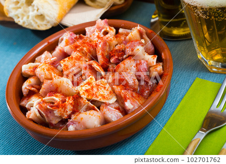 Spanish tapas - pig ears with paprika 102701762