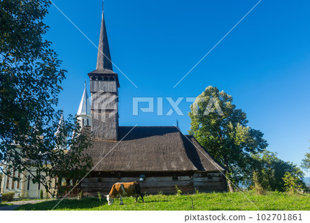 Old and new church in Remetea Chioarului , Romania Old and new church in Remetea Chioarului , Romania 102701861
