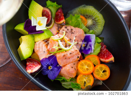 Ceviche of salmon with kiwi fruit, avocado, kumquat, figs Ceviche of salmon with kiwi fruit, avocado, kumquat, figs 102701863