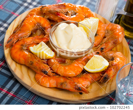 Appetizing baked shrimps 102702245