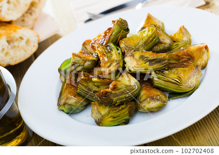 Roasted in oil artichokes Roasted in oil artichokes 102702408