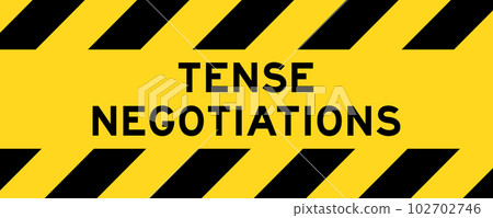 Yellow and black color with line striped label banner with word tense negotiations 102702746