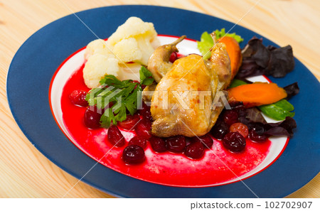 Grilled quail with sauce and vegetables Grilled quail with sauce and vegetables 102702907