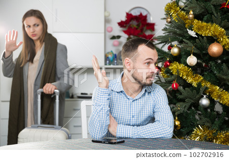 Unhappy couple quarreling 102702916