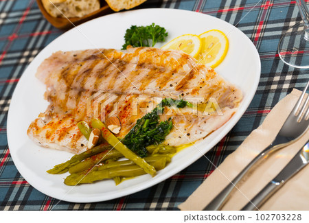 Baked ocean perch fillet Baked ocean perch fillet 102703228