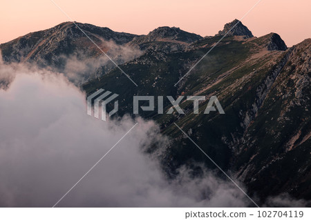 Mt. Houkendake and Mt. Kisokomagatake in the afterglow seen from Mt. Kumazawa, Central Alps 102704119