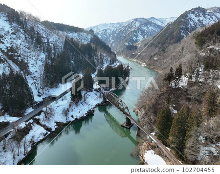 Aerial footage of the restored Tadami Line and the Fourth Tadami River Bridge. Aerial footage of the restored Tadami Line and the Fourth Tadami River Bridge. 102704455