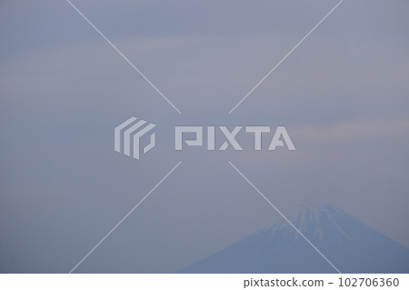 Fuji beyond the morning mist Placed in the right corner of the screen The sky is a copy space 102706360