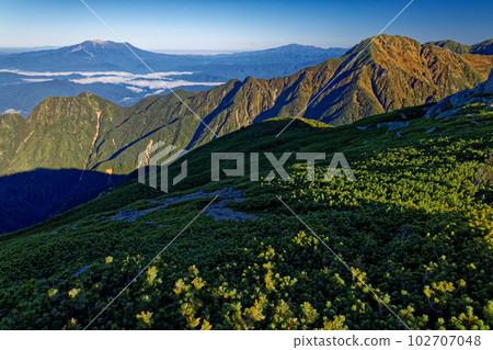 Mt. Sannosawa and Mt. Mitake and Mt. Norikura seen from Mt. Kumazawa in the Central Alps in the morning 102707048