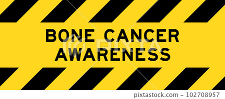 Yellow and black color with line striped label banner with word bone cancer awareness 102708957