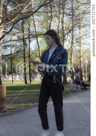 Portrait of a beautiful girl with a book. Portrait of a beautiful girl with a book. 102711703