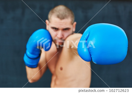 Boxer in blue gloves 102712623