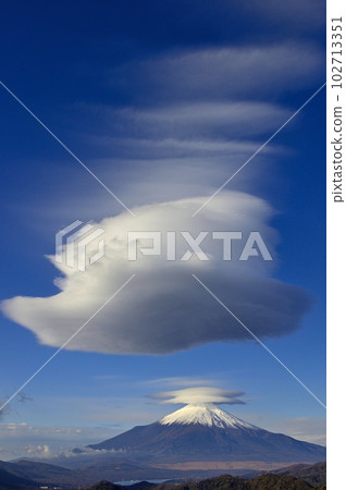 Mt.Fuji with hanging clouds and hazy clouds seen from the summit of Mt. 102713351