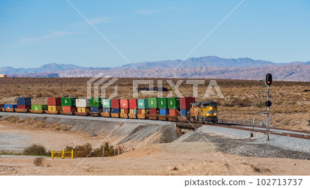 Container of long-haul freight trains crossing the Americas Container of long-haul freight trains crossing the Americas 102713737