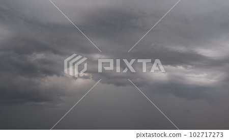 Detail shot of epic storm clouds during sunrise 102717273