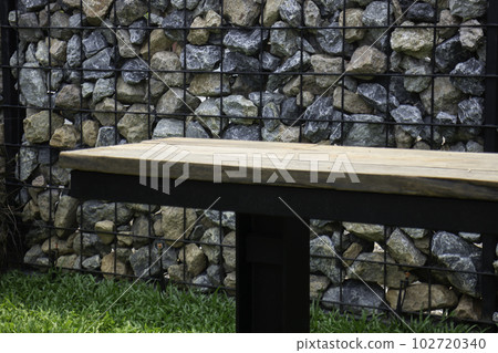 Tropical garden with botanic plants stone Tropical garden with botanic plants stone 102720340