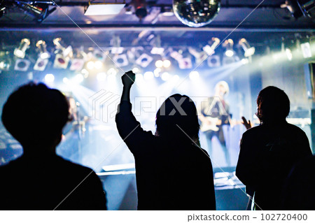 Fans cheering and having fun at a live house 102720400