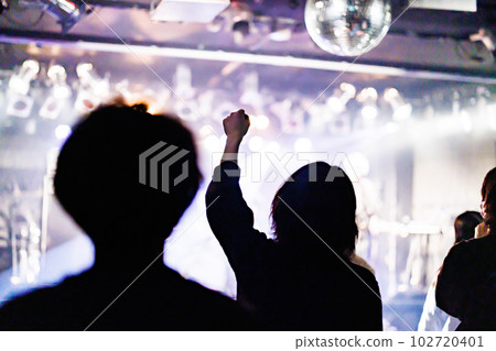 Fans cheering and having fun at a live house 102720401